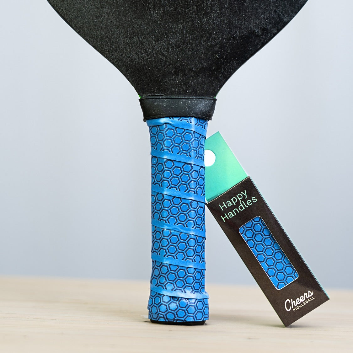 Happy Handles  Atlantic Blue with with hexagon textured design displayed on a paddle