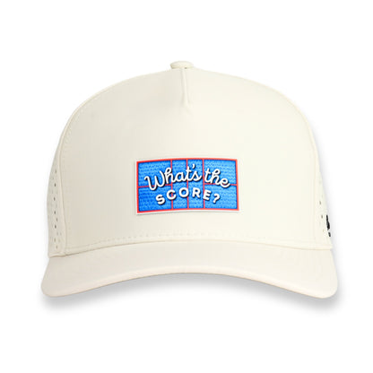 A performance pickleball hat in white designed for comfort, performance, and style. Front of hat says: "What's the score?"