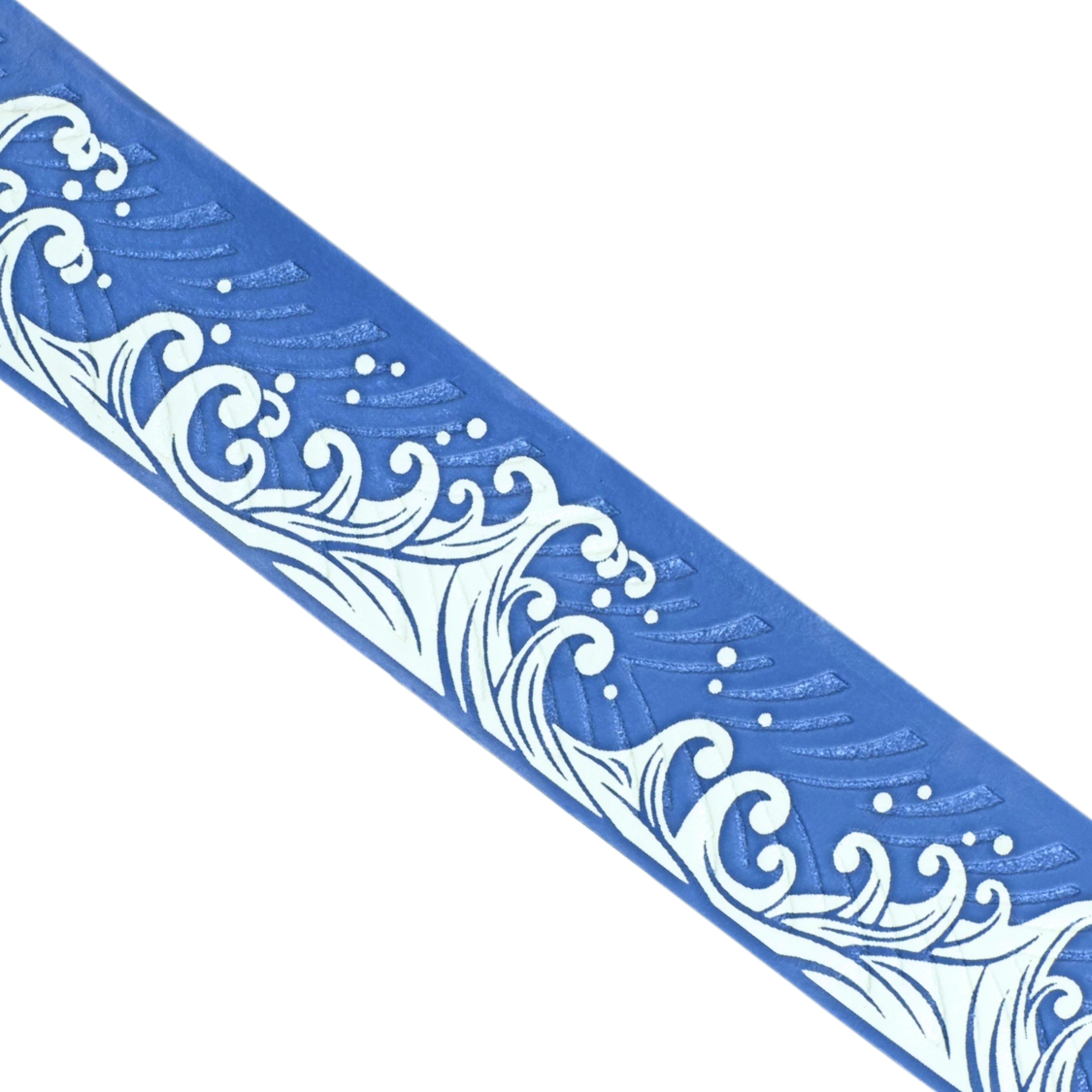 Close-up of Happy Handles Salt Spray Pickleball Grip featuring a white wave pattern with blue background